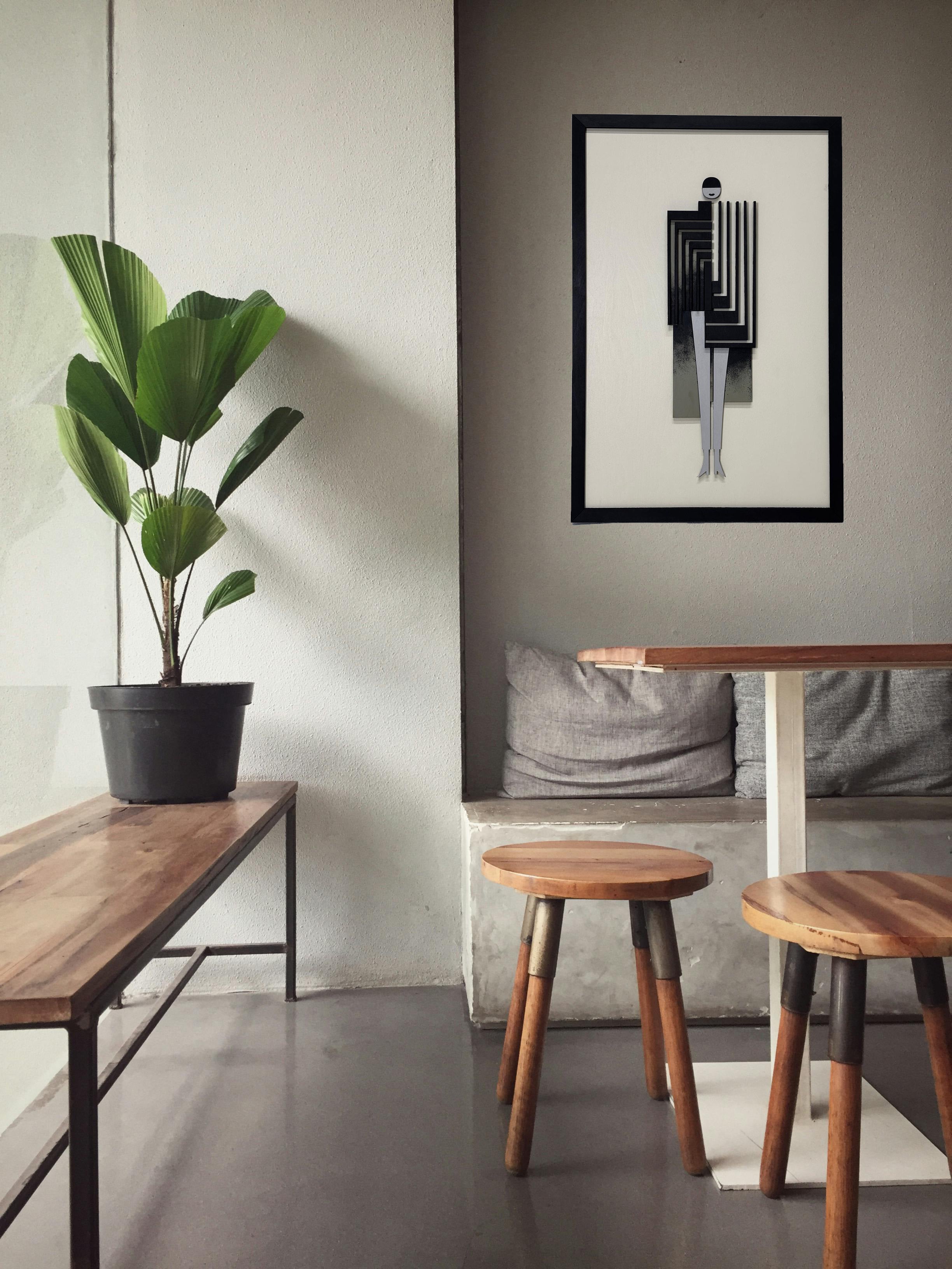 Lady in a Coat / Wooden Tiered Table